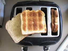 Put 2 slices of bread in one toaster slot